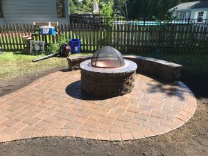 fire pit and stone seating area in Marlton, NJ